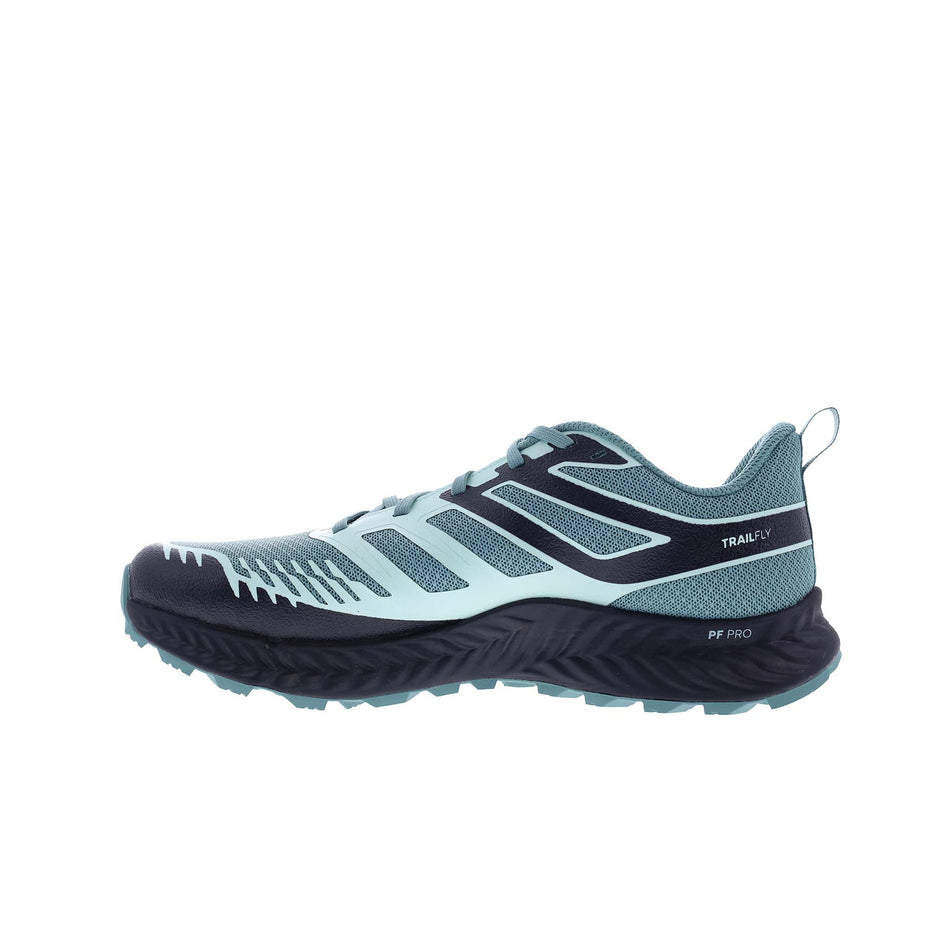Medial side of the right shoe from a pair of INOV8 Women's TrailFly Running Shoes in the Light Green/Dark Teal colourway. (8628495483042)