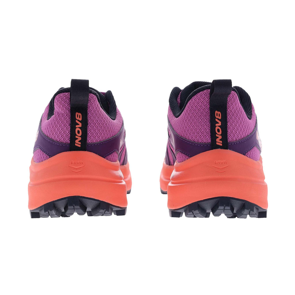 The back of a pair of INOV8 Women's Trailtalon Max Running Shoes in the Purple/Coral colourway.