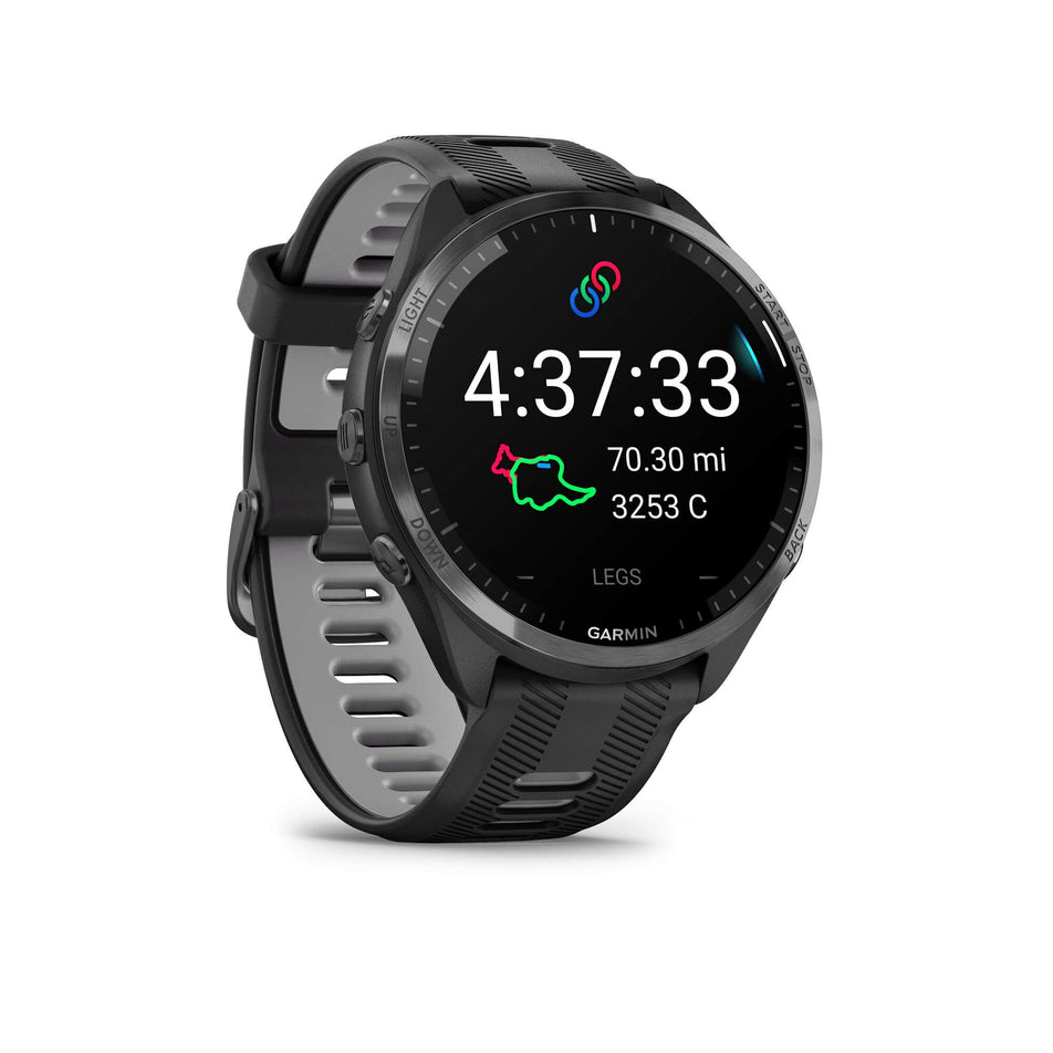 The front of a Garmin Forerunner 965 Running Smartwatch. Carbon Grey DLC Titanium Bezel with Black Case and Black/Powder Grey Silicone Band. Example of a time, distance and calorie metrics showing on screen. (7909894389922)