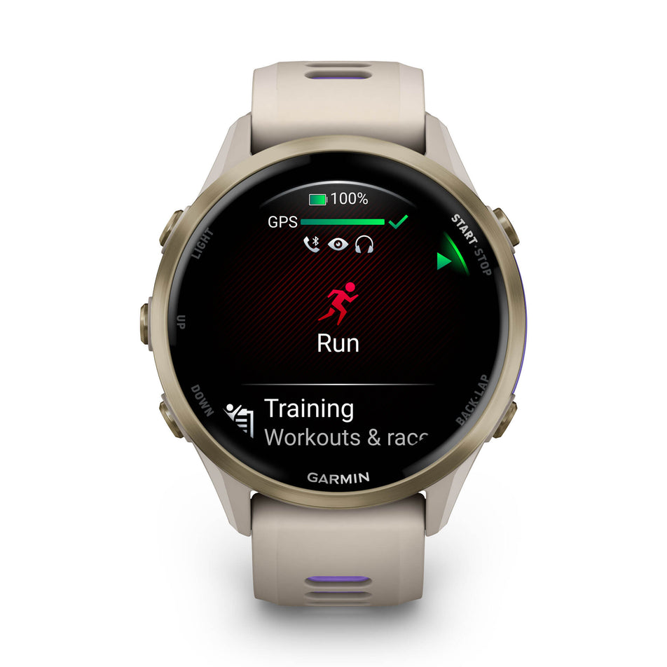 A Garmin Forerunner 970. Soft Gold Titanium with French Grey Case and French Grey/Translucent Indigo Band. Run start screen. (8692403962018)
