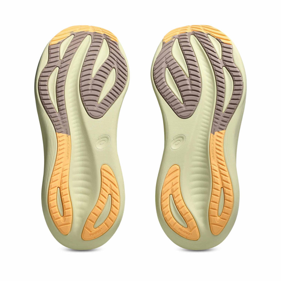 The outsoles of a pair of ASICS Men's Gel-Nimbus 27 Running Shoes in the White/Fawn colourway. (8669035430050)