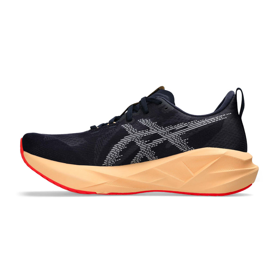 Medial view of the right shoe from a pair of ASICS Men's Novablast 5 Running Shoes in the Midnight/Orange colourway. (8669077307554)
