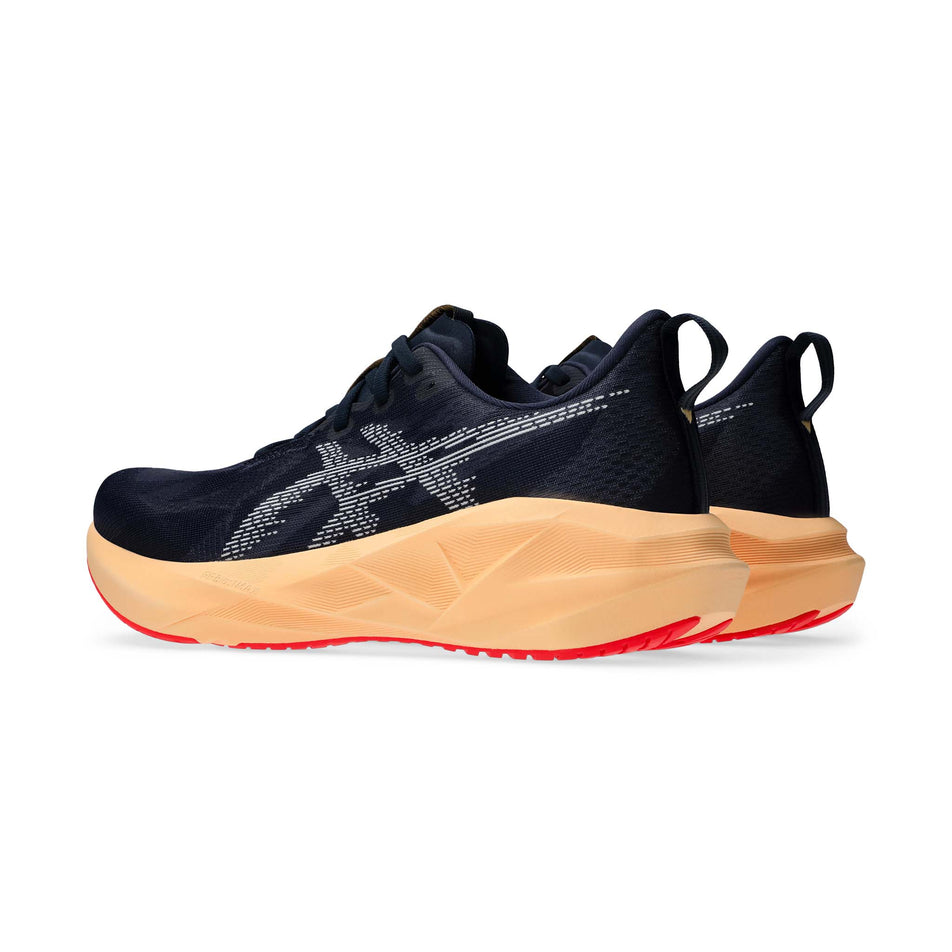 A pair of ASICS Men's Novablast 5 Running Shoes in the Midnight/Orange colourway. (8669077307554)