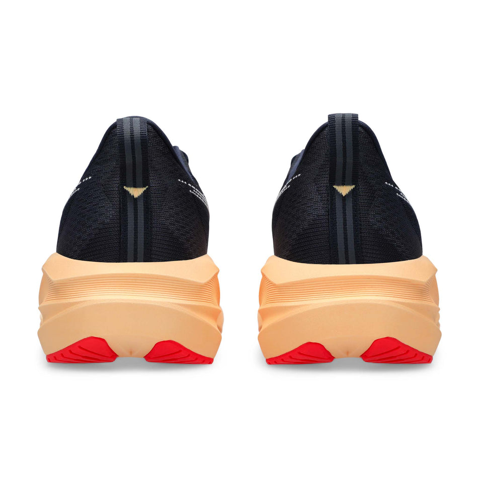 The back of a pair of ASICS Men's Novablast 5 Running Shoes in the Midnight/Orange colourway. (8669077307554)