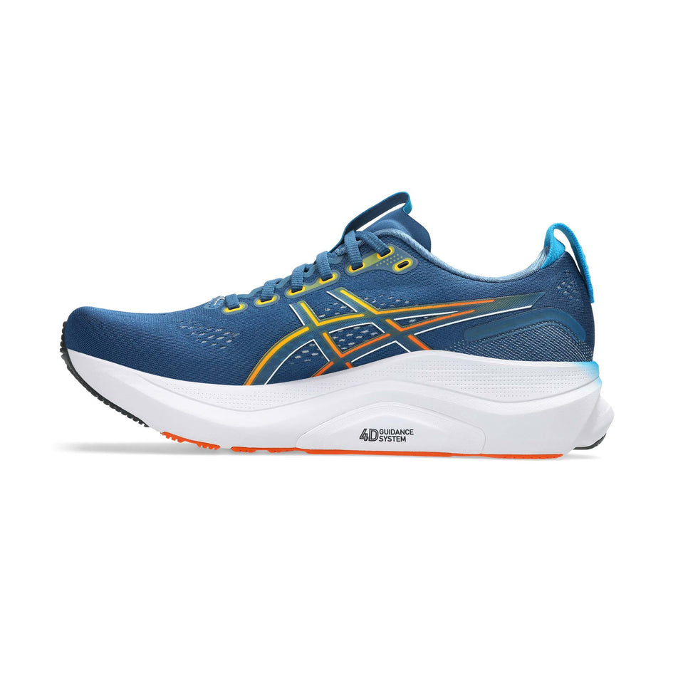 Medial view of the right shoe from a pair of ASICS Men's Gel-Kayano 32 Running Shoes in the Twilight Blue/Anzu colourway.