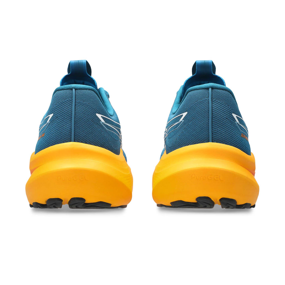 The back of a pair of ASICS Men's GT-2000 14 Running Shoes in the Dark Teal/White colourway.