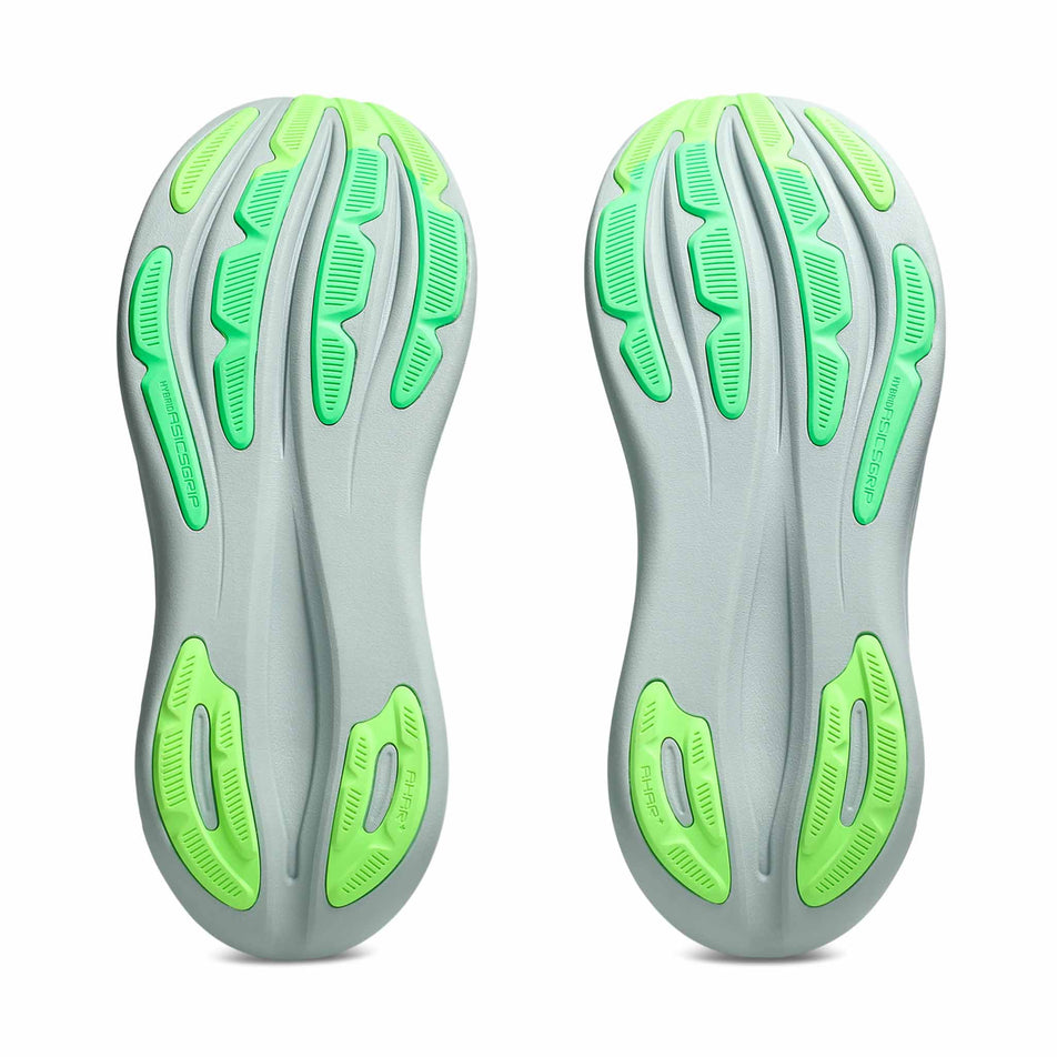 The outsoles of a pair of ASICS Men's Gel-Nimbus 28 Running Shoes in the Cold Moss/Illuminate Green colourway.
