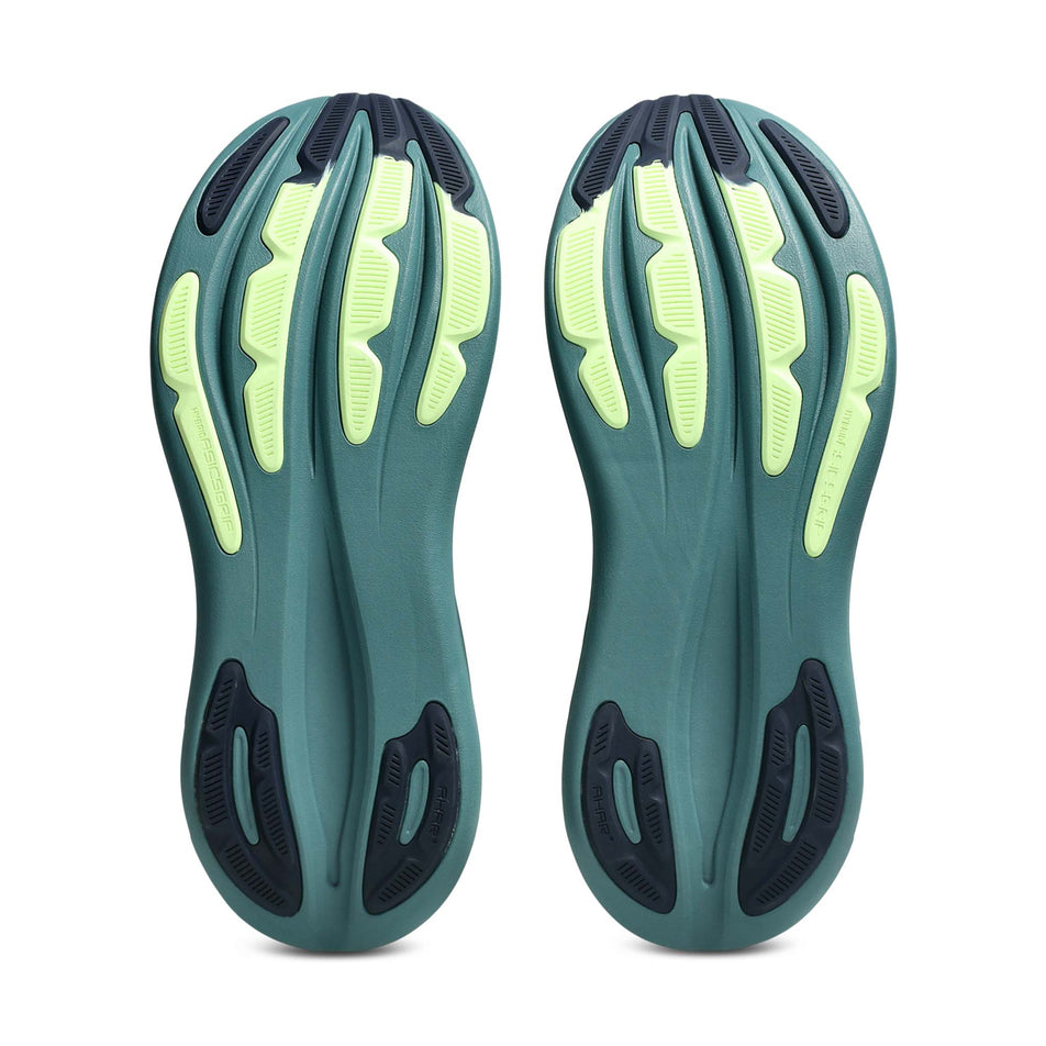 The outsoles of a pair of ASICS Men's Gel-Nimbus 28 Running Shoes in the Illuminate Yellow/Foggy Teal colourway.