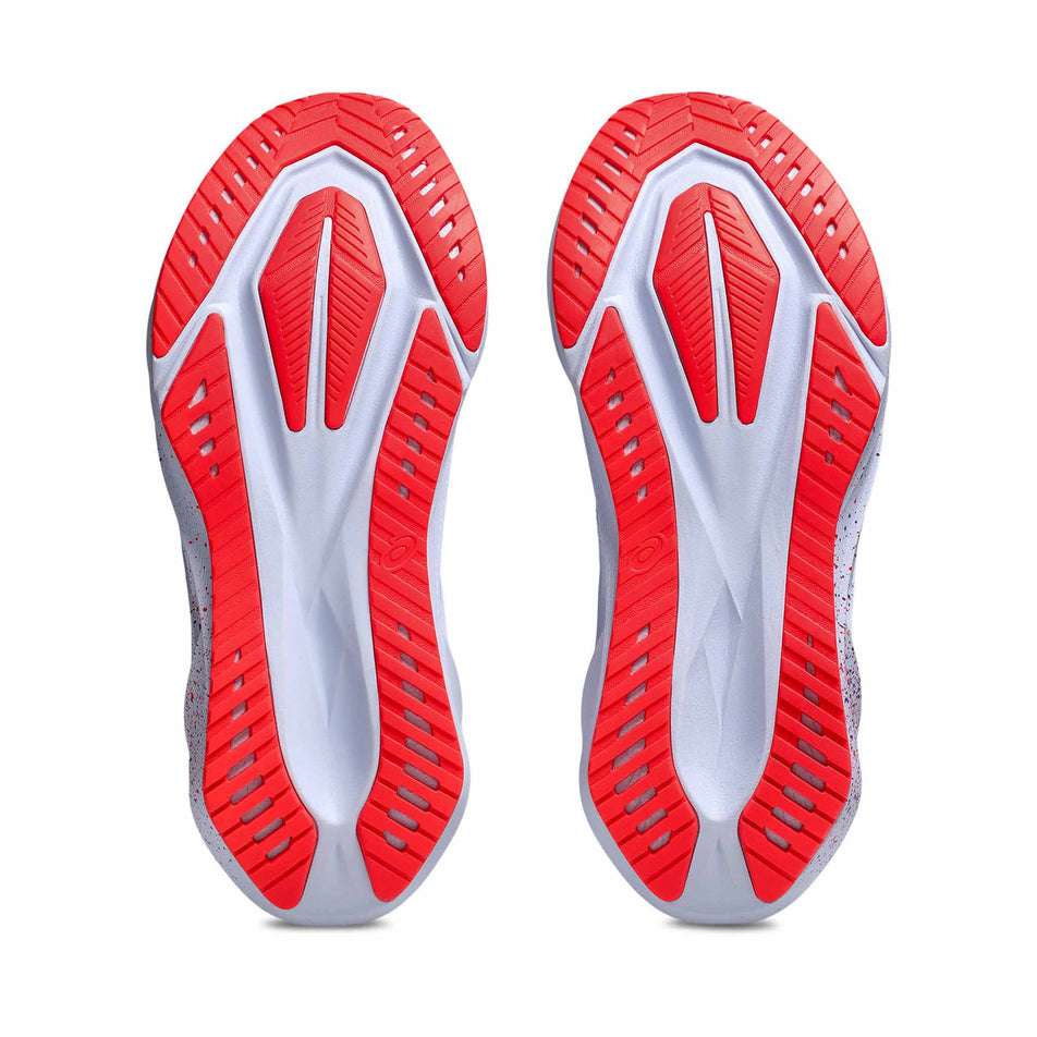 The outsoles of a pair of ASICS Men's Novablast 5 Tokyo Running Shoes in the Blue Fade/Edo Purple colourway. (8720406806690)