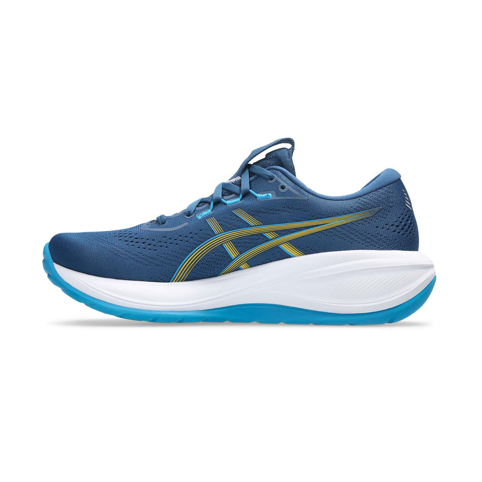 Medial view of the right shoe from a pair of ASICS Men's Gel-Cumulus 28 Running Shoes in the Twilight Blue/Amabuki colourway.