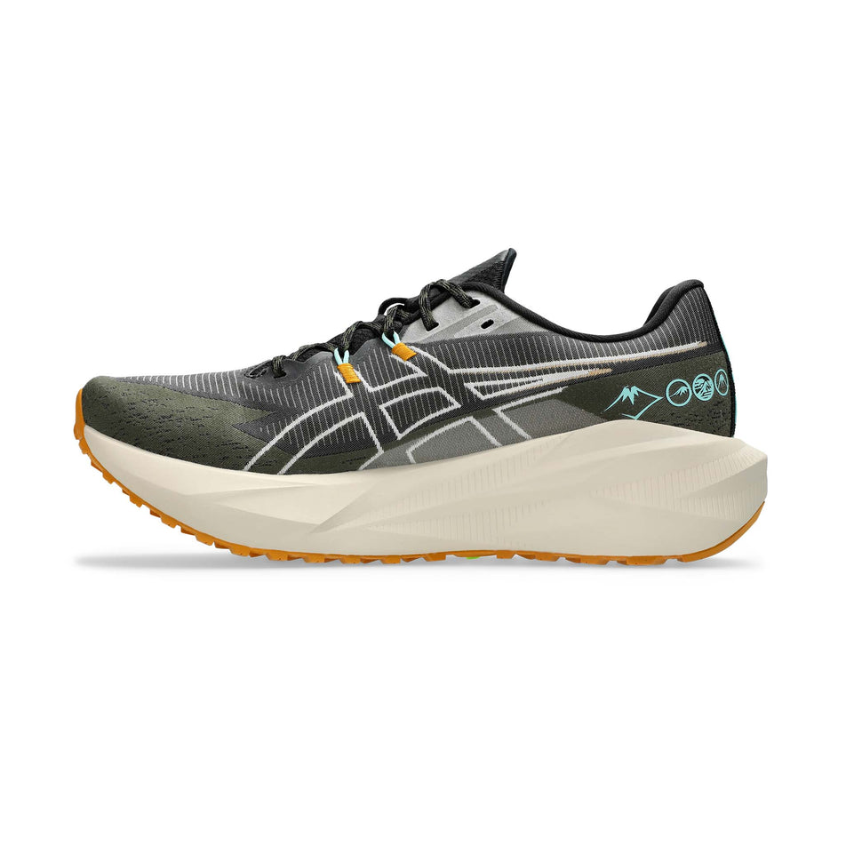 Medial view of the right shoe from a pair of ASICS Men's Blazeblast Running Shoes in the Black/Sandstorm colourway.