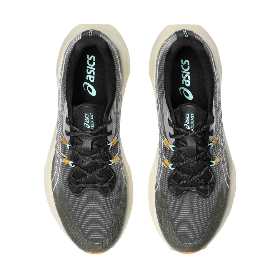 The uppers of a pair of ASICS Men's Blazeblast Running Shoes in the Black/Sandstorm colourway.