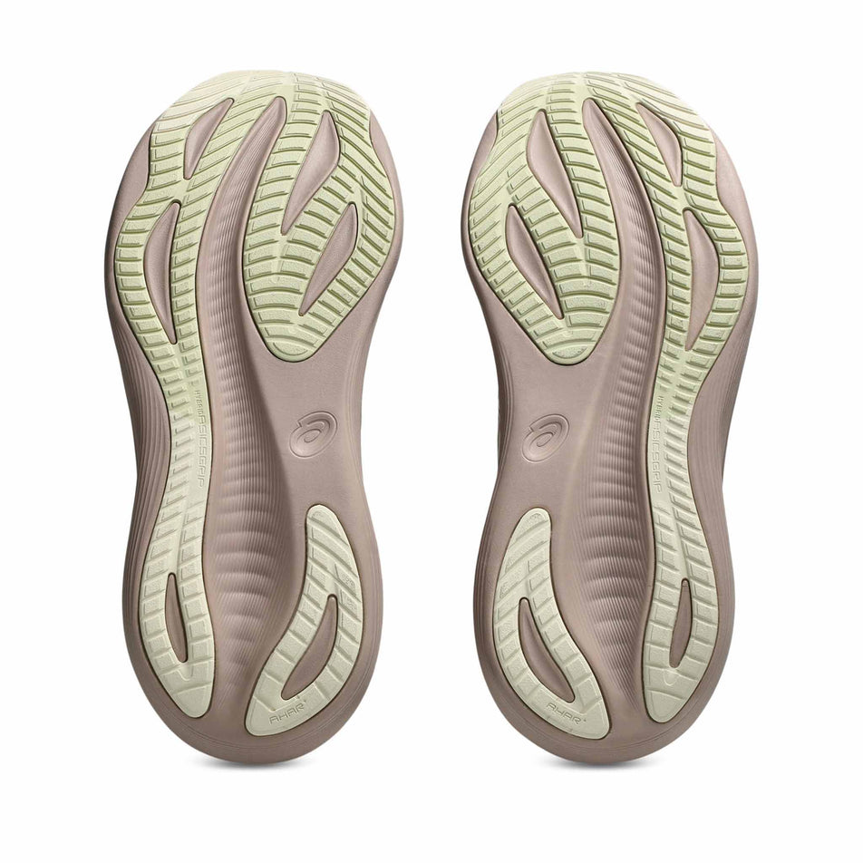 The outsoles of a pair of ASICS Women's Gel-Nimbus 27 Running Shoes in the Fawn/Birch colourway. (8669093331106)