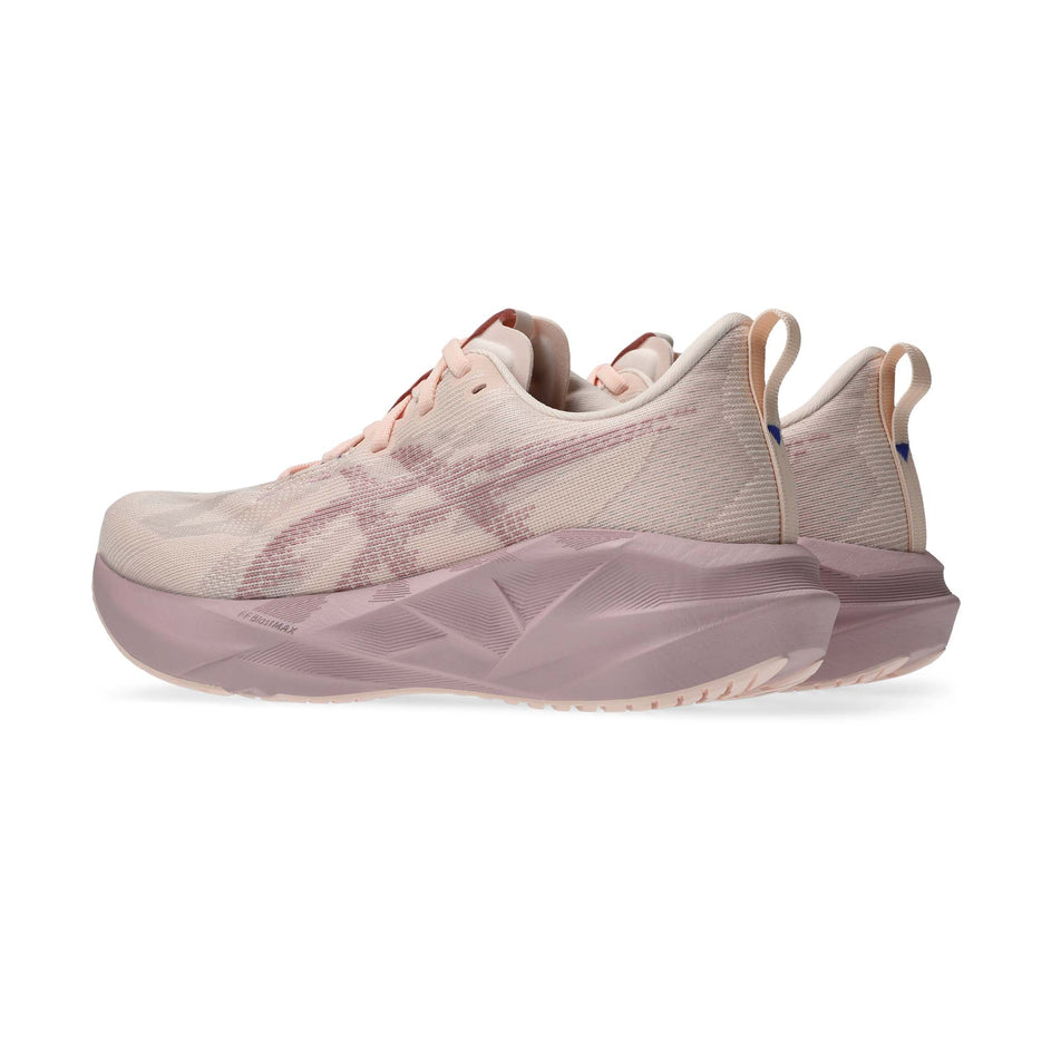 A pair of ASICS Women's Novablast 5 Running Shoes in the Pearl/Morganite colourway.