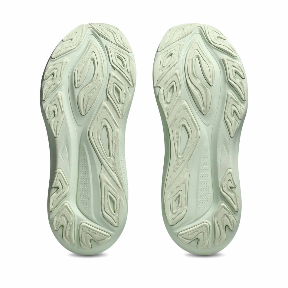 The outsoles of a pair of ASICS Women's GT-2000 14 Running Shoes in the Whisper Green/Monument colourway. (8669090185378)