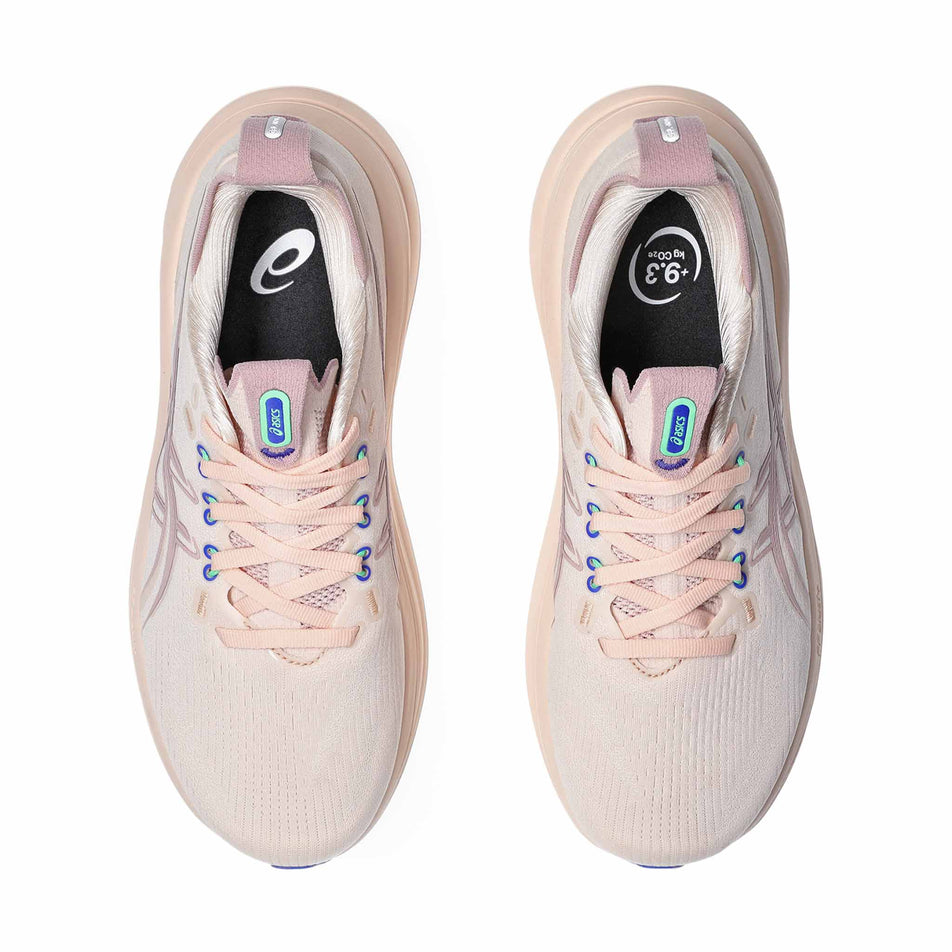The uppers of a pair of ASICS Women's Gel-Nimbus 28 Running Shoes in the Pearl Pink/Morganite colourway.