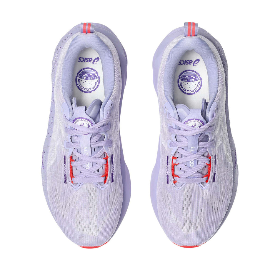 The uppers of a pair of ASICS Women's Novablast 5 Tokyo Running Shoes in the Vador/Edo Purple colourway. (8720469229730)