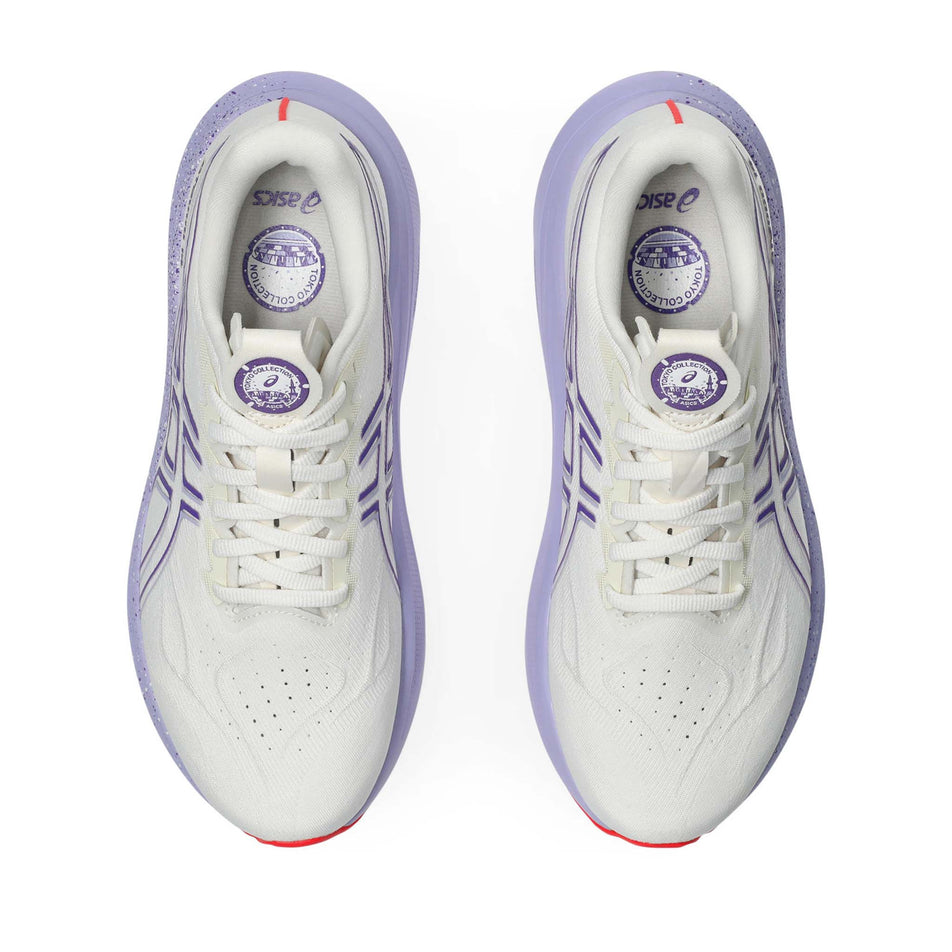 The uppers of a pair of ASICS Women's GT-2000 14 Tokyo Running Shoes in the Cream/Edo Purple colourway. (8720459333794)