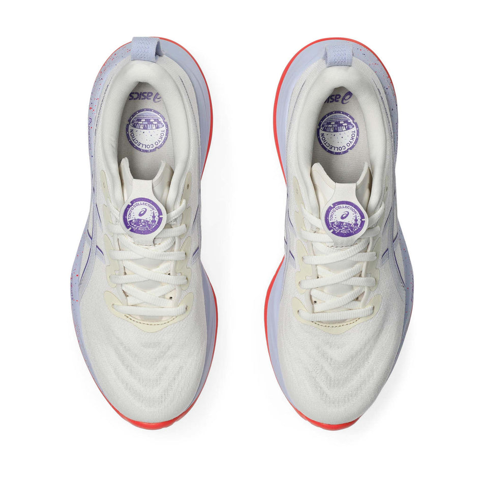The uppers of a pair of ASICS Women's Gel-Cumulus 27 Tokyo Running Shoes in the Cream/Edo Purple colourway. (8720465461410)