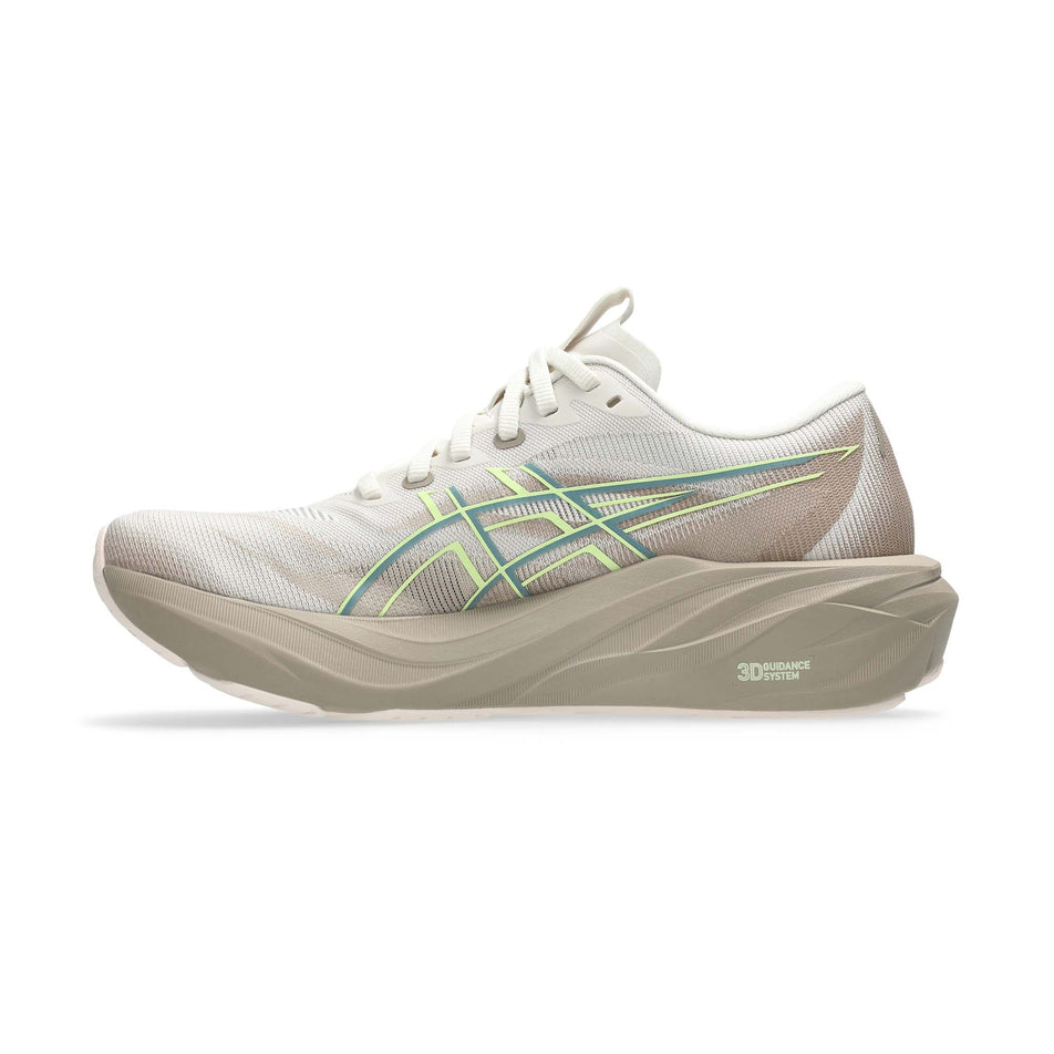 Medial view of the right shoe from a pair of ASICS Women's GT-2000 15 Running Shoes in the Birch/Greige colourway.