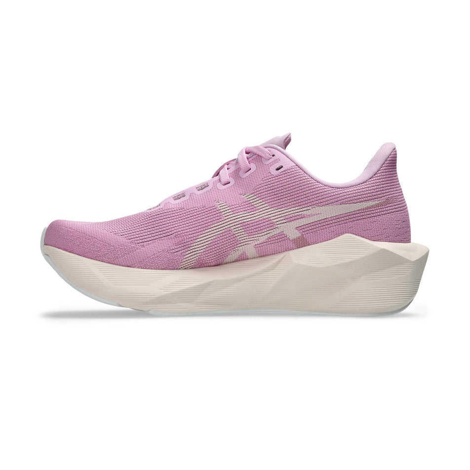 Medial view of the right shoe from a pair of ASICS Women's Novablast 6 Running Shoes in the Hazy Lilac/Rose Dust colourway.