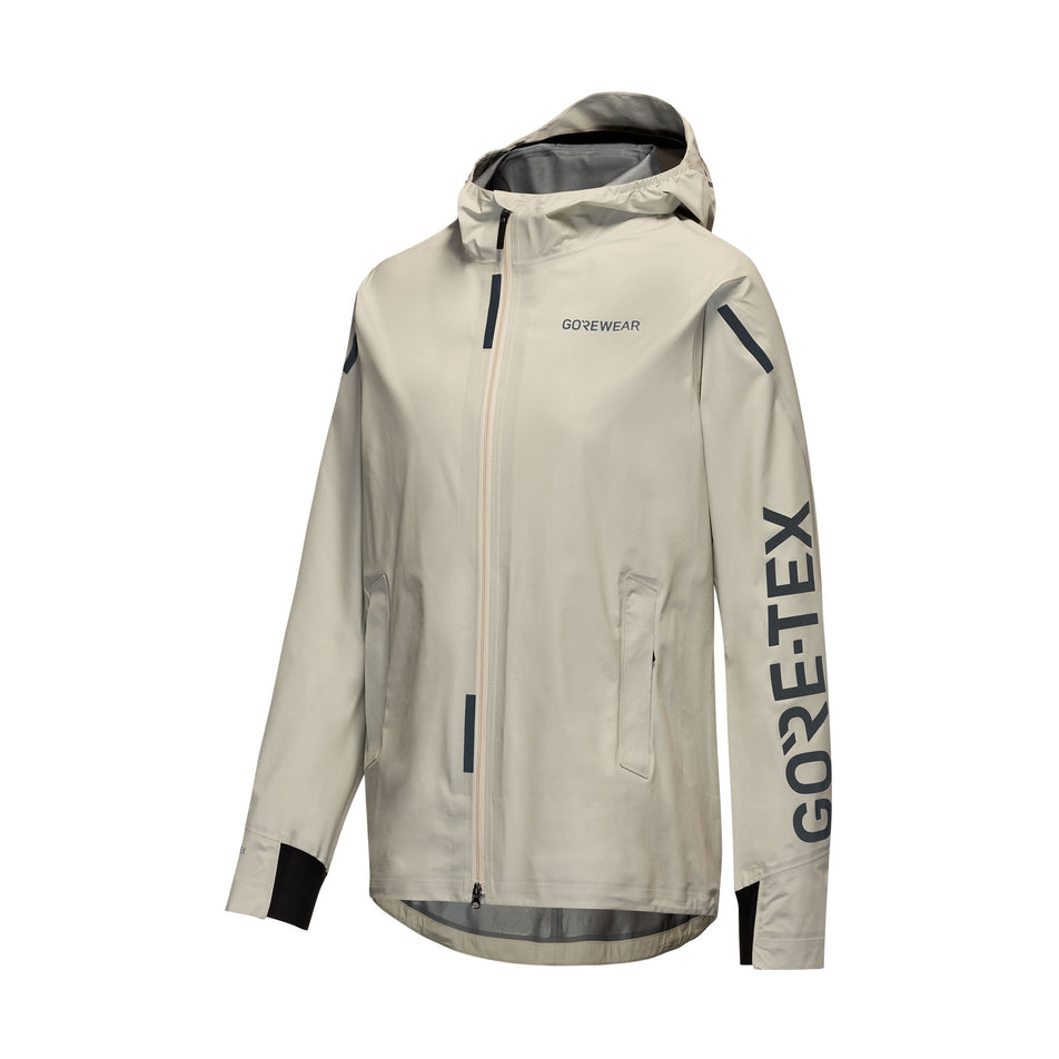 Front view of the GOREWEAR Women's Concurve GORE-TEX Logo Jacket in the Tech Beige/Black colourway. (8752081207458)