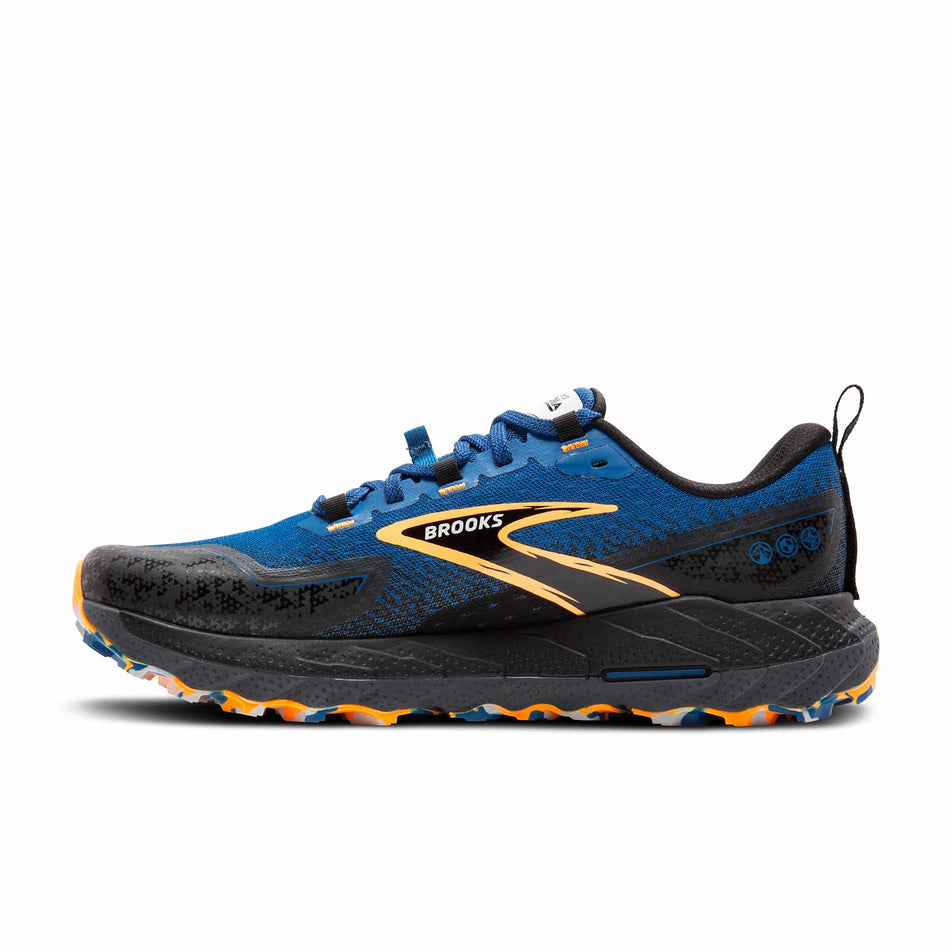 Medial side of the right shoe from a pair of Brooks Men's Cascadia 18 Running Shoes in the Blue Sapphire/Black/Orange colourway (8406860267682)