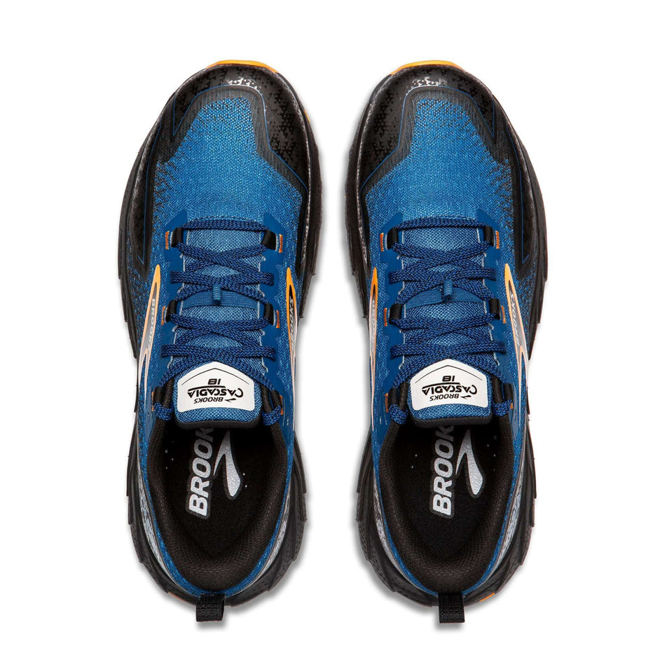 The uppers on a pair of Brooks Men's Cascadia 18 Running Shoes in the Blue Sapphire/Black/Orange colourway (8406860267682)