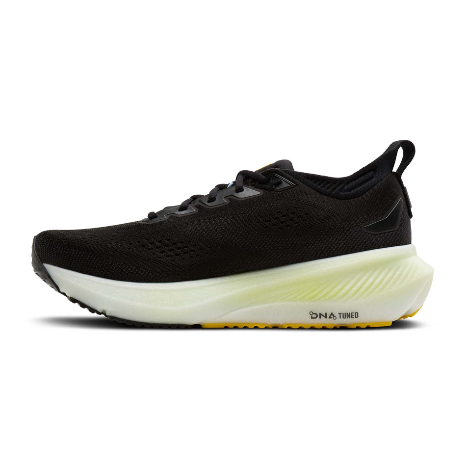Medial view of the right shoe from a pair of Brooks Men's Glycerin 23 Running Shoes in the Black/Cyber Yellow/Nightlife colourway.