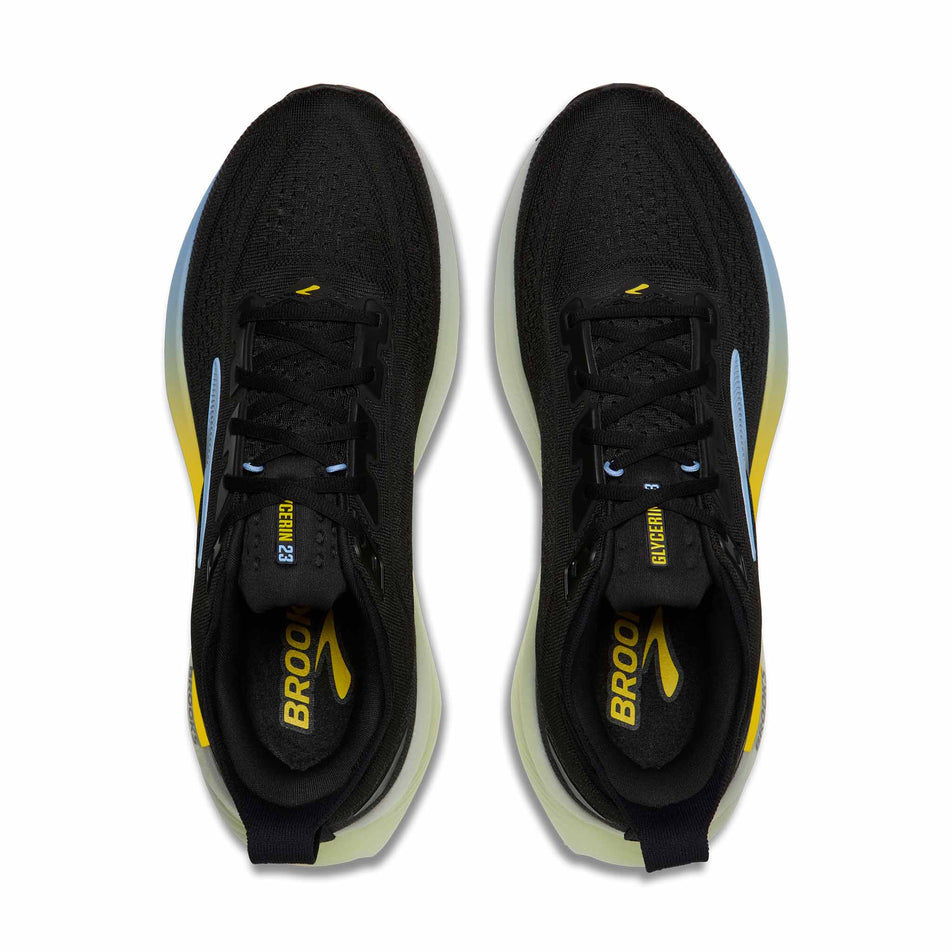 The uppers of a pair of Brooks Men's Glycerin 23 Running Shoes in the Black/Cyber Yellow/Nightlife colourway.