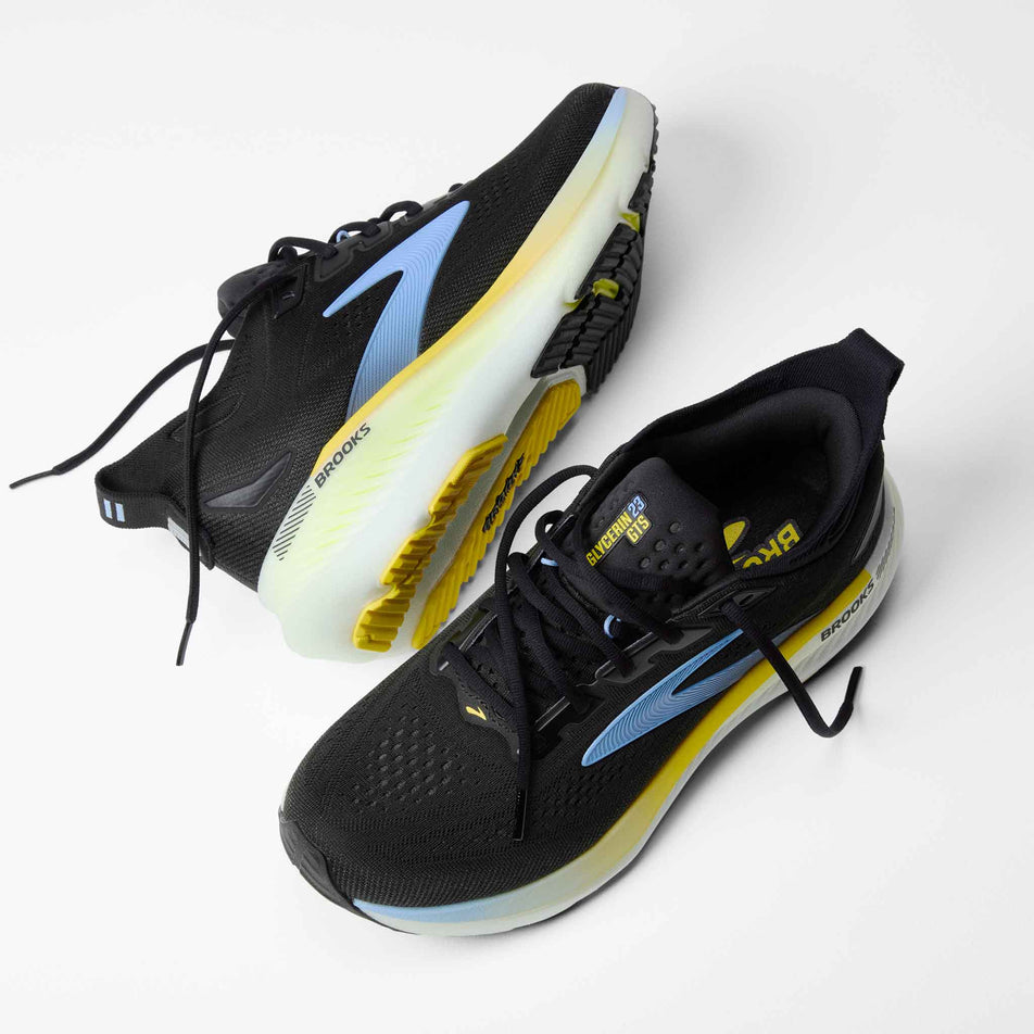 A pair of Brooks Men's Glycerin GTS 23 Running Shoes in the Black/Cyber Yellow/Nightlife colourway.