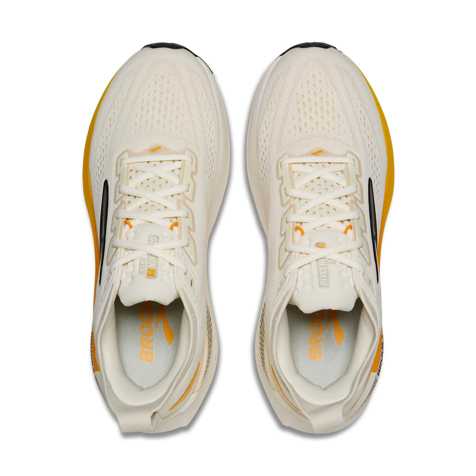 The uppers of a pair of Brooks Men's Glycerin GTS 23 Running Shoes in the Arctic Wolf/Angora/Orange colourway.