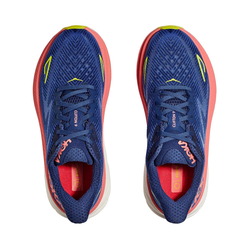 The uppers on a pair of HOKA Women's Clifton 9 Running Shoes in the Evening Sky/Coral colourway (8144922411170)