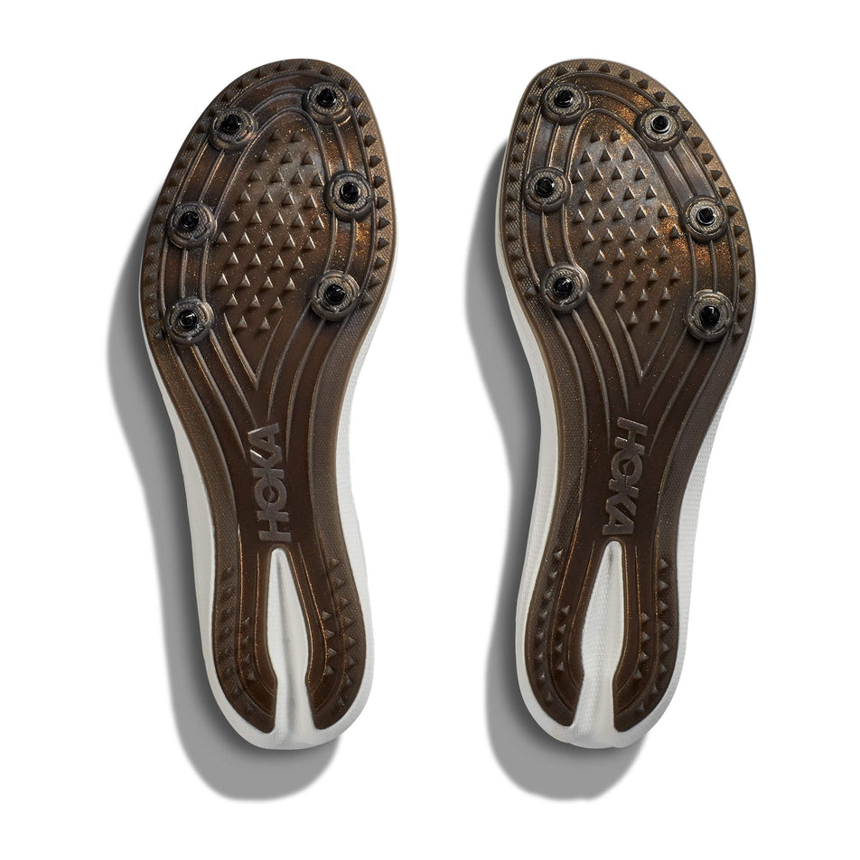 The outsole of a pair of HOKA Unisex Crescendo MD Running Spikes in the Black/White colourway (8232934899874)