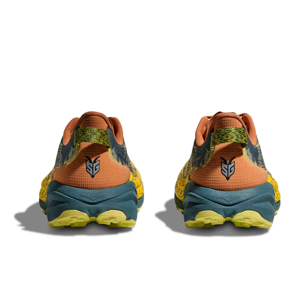 The back of a pair of HOKA Men's Speedgoat 6 Running Shoes in the Terra Cotta/Mountain Fog colourway. (8580384161954)