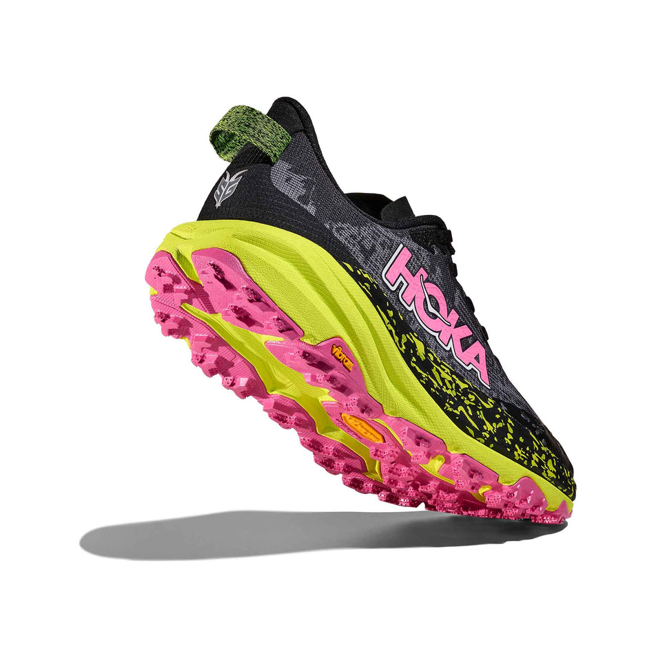 Lateral - and outsole - view of the right shoe from a pair of HOKA Women's Speedgoat 6 Running Shoes in the Black/Neon Hoka Citrus colourway. (8689341759650)