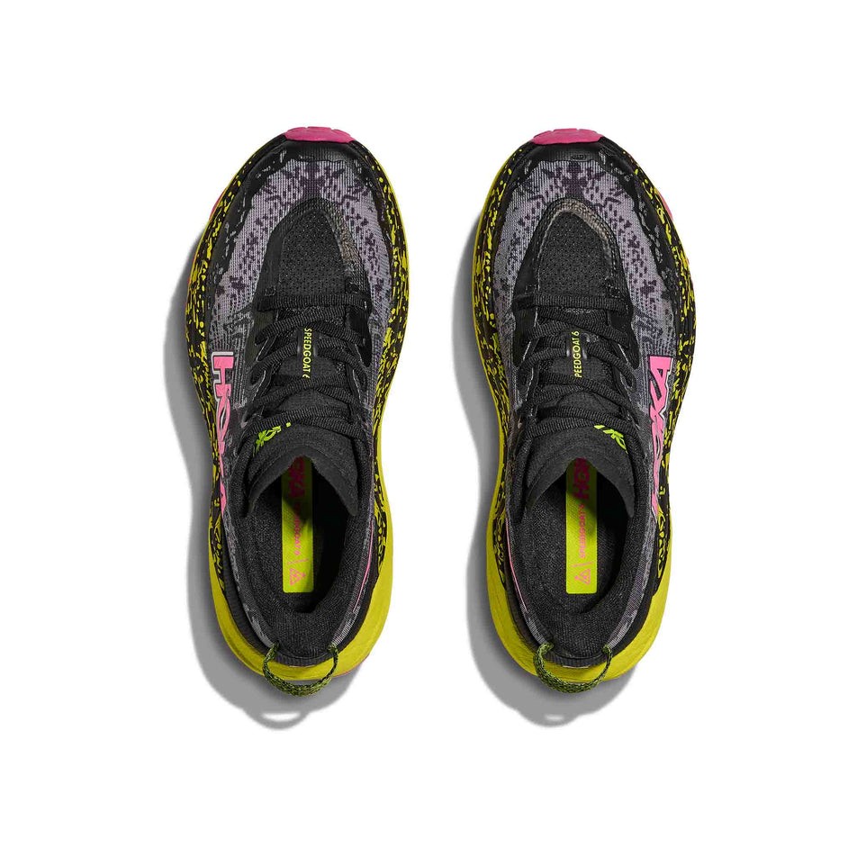 The uppers of a pair of HOKA Women's Speedgoat 6 Running Shoes in the Black/Neon Hoka Citrus colourway. (8689341759650)