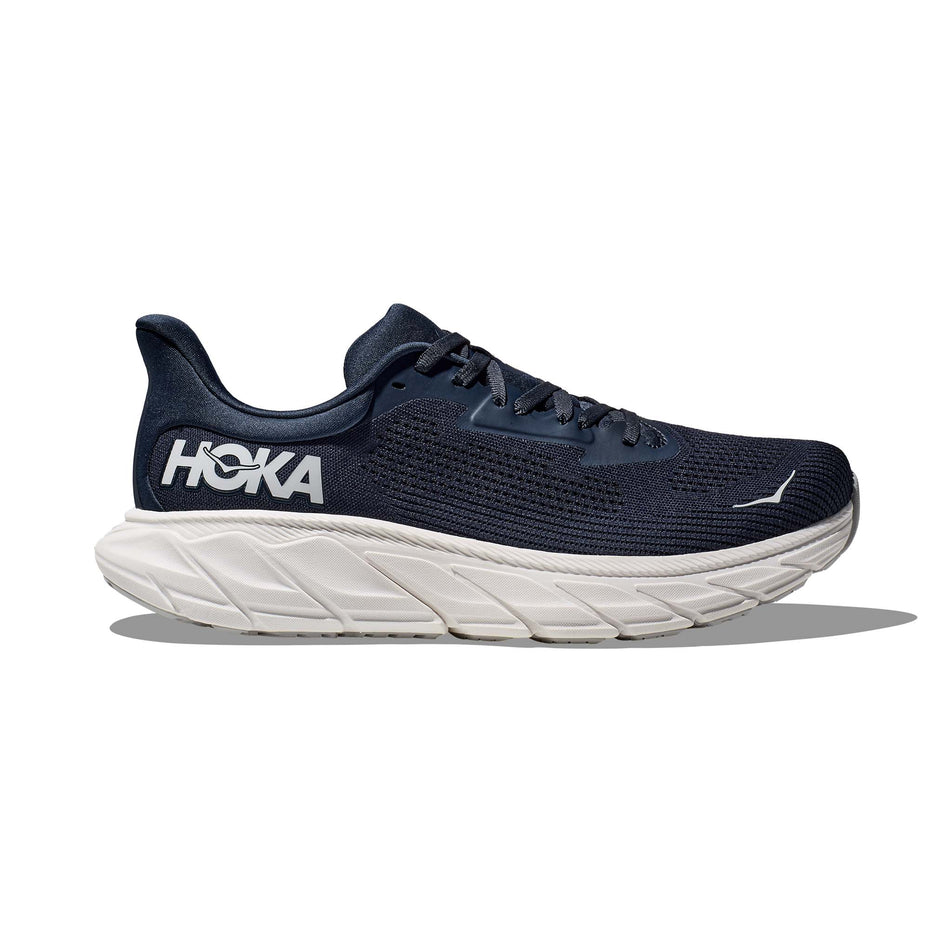 Lateral side of the right shoe from a pair of HOKA Men's Arahi 7 Running Shoes in the Outer Space/White colourway (8144924115106)