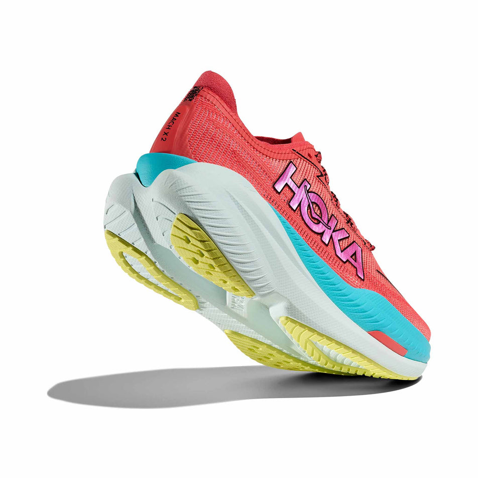 Lateral side - and outsole - of the right shoe from a pair of HOKA Men's Mach X 2 Running Shoes in the Grapefruit/Electrical Coral colourway. (8580357849250)