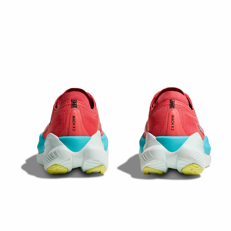 The back of a pair of HOKA Men's Mach X 2 Running Shoes in the Grapefruit/Electrical Coral colourway. (8580357849250)