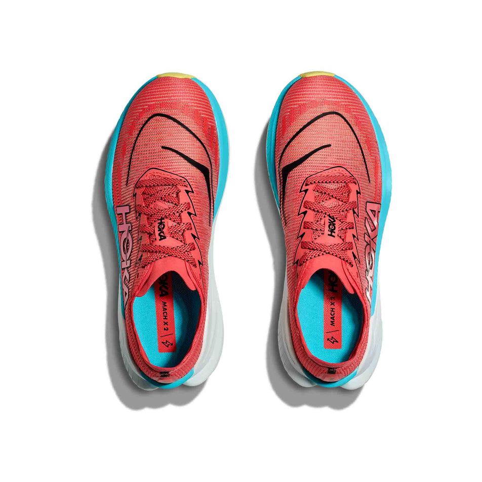 The uppers on a pair of HOKA Men's Mach X 2 Running Shoes in the Grapefruit/Electrical Coral colourway. (8580357849250)