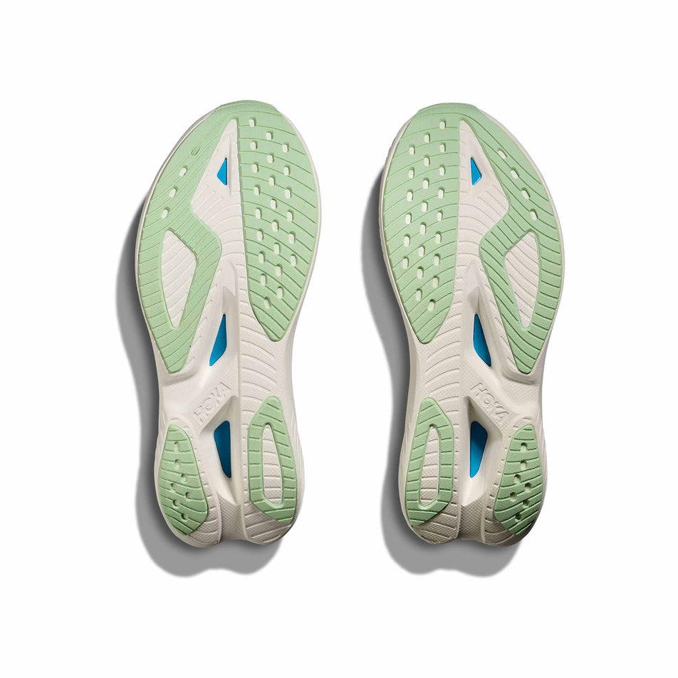 The outsoles of a pair of HOKA Women's Mach X 2 Running Shoes in the Snow Melt/Blue Spark colourway. (8580389666978)