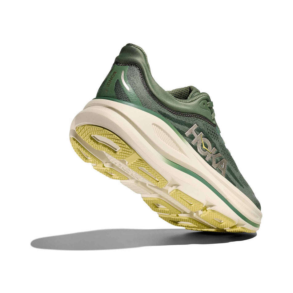 Lateral - and outsole - view of the right shoe from a pair of HOKA Men's Bondi 9 Running Shoes in the Succulent/Fern colourway. (8689203642530)