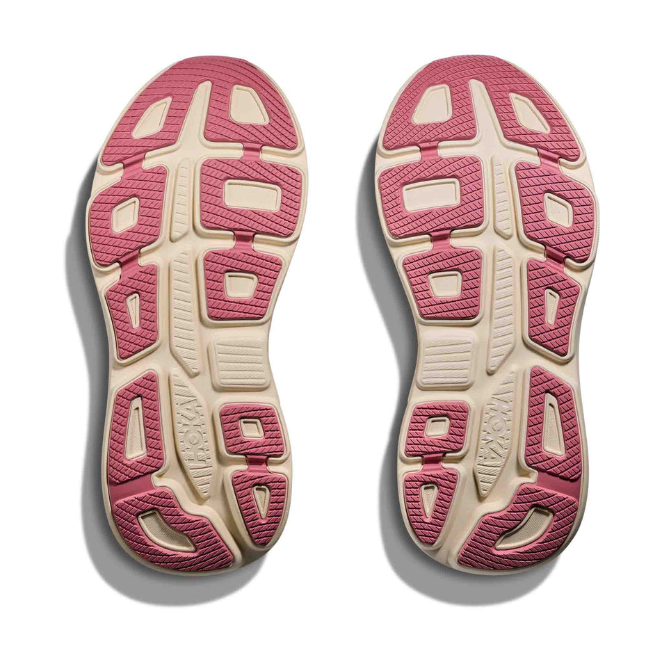 The outsoles of a pair of HOKA Women's Bondi 9 Running Shoes in the Lingonberry/Cranberry colourway.