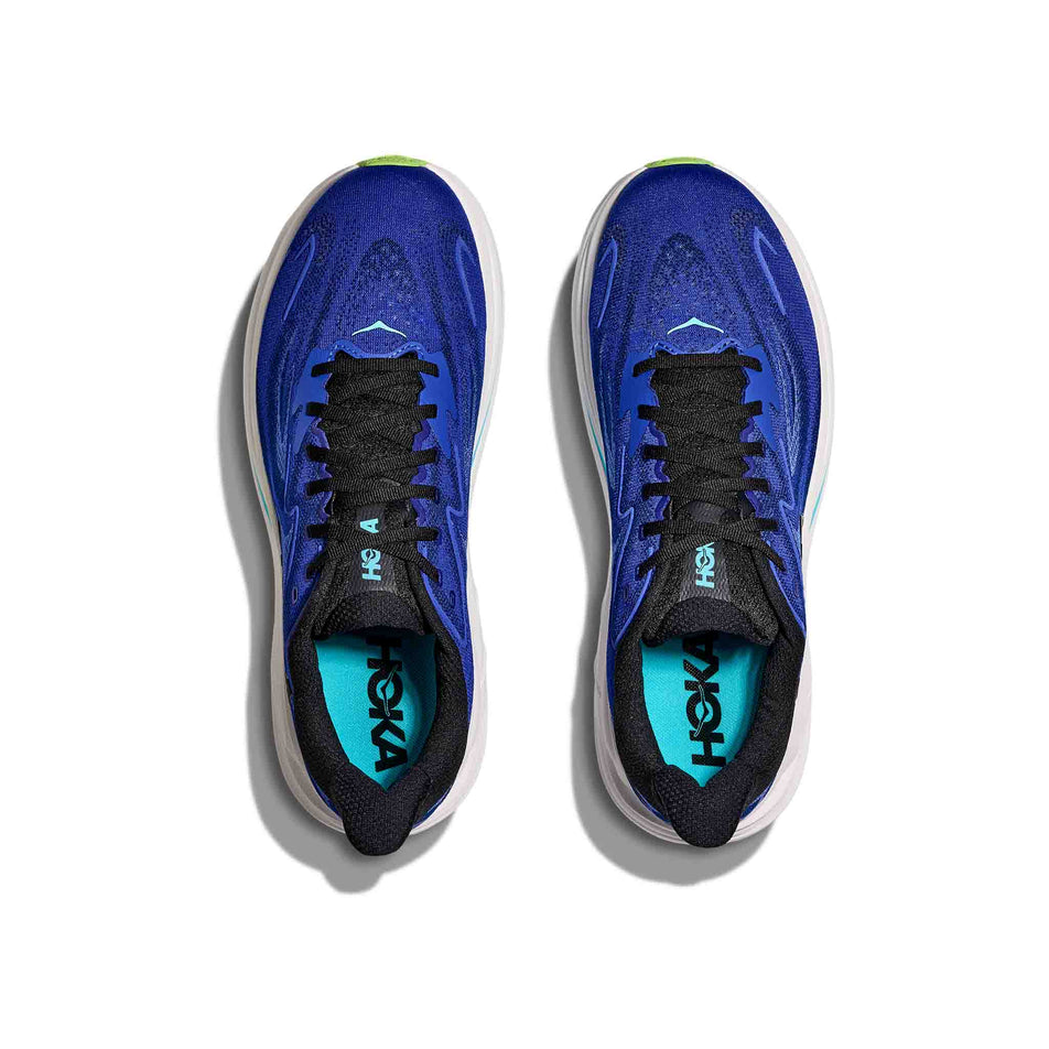 The uppers of a pair of HOKA Men's Clifton 10 Running Shoes in the Night Sky/Midnight Blue colourway. (8689185095842)