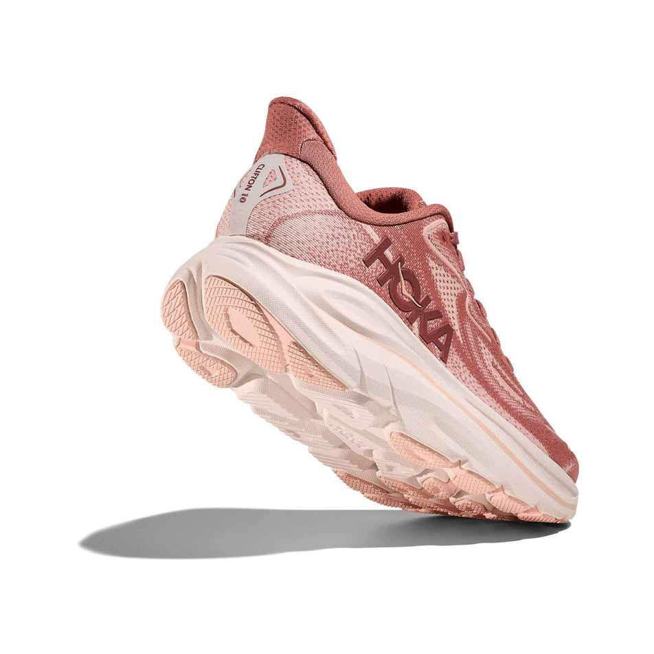 Lateral - and outsole - view of the right shoe from a pair of HOKA Women's Clifton 10 Running Shoes in the Blush/Rose Latte colourway. (8689269244066)