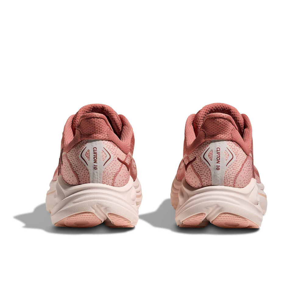 The back of a pair of HOKA Women's Clifton 10 Running Shoes in the Blush/Rose Latte colourway. (8689269244066)