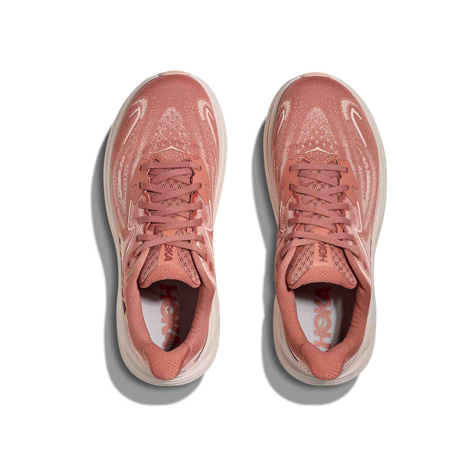 The uppers of a pair of HOKA Women's Clifton 10 Running Shoes in the Blush/Rose Latte colourway. (8689269244066)