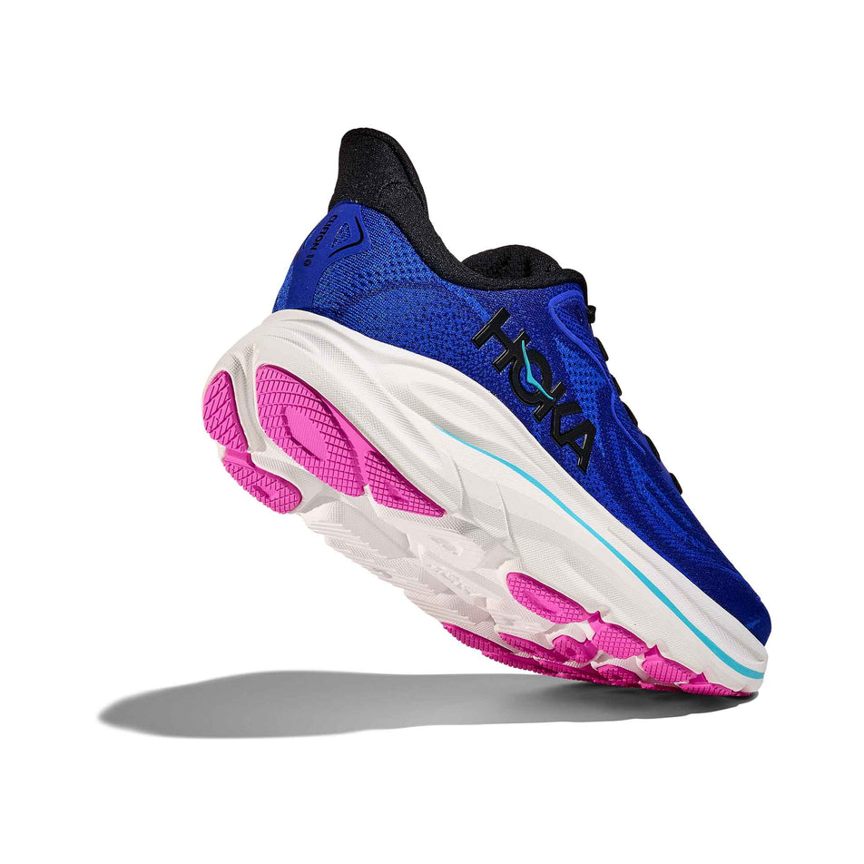 Lateral - and outsole - view of the right shoe from a pair of HOKA Women's Clifton 10 Running Shoes in the Night Sky/Ultramarine colourway. (8689257742498)