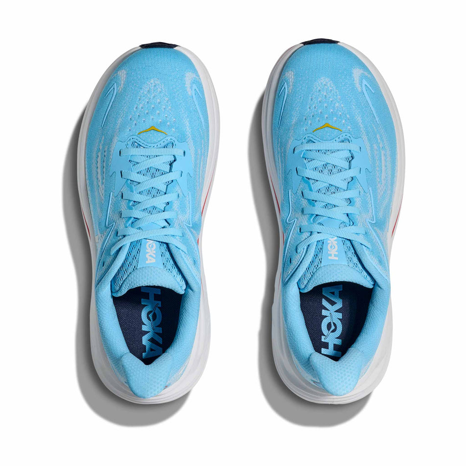 The uppers of a pair of HOKA Women's Clifton 10 Running Shoes in the Soaring Blue/Frost colourway.